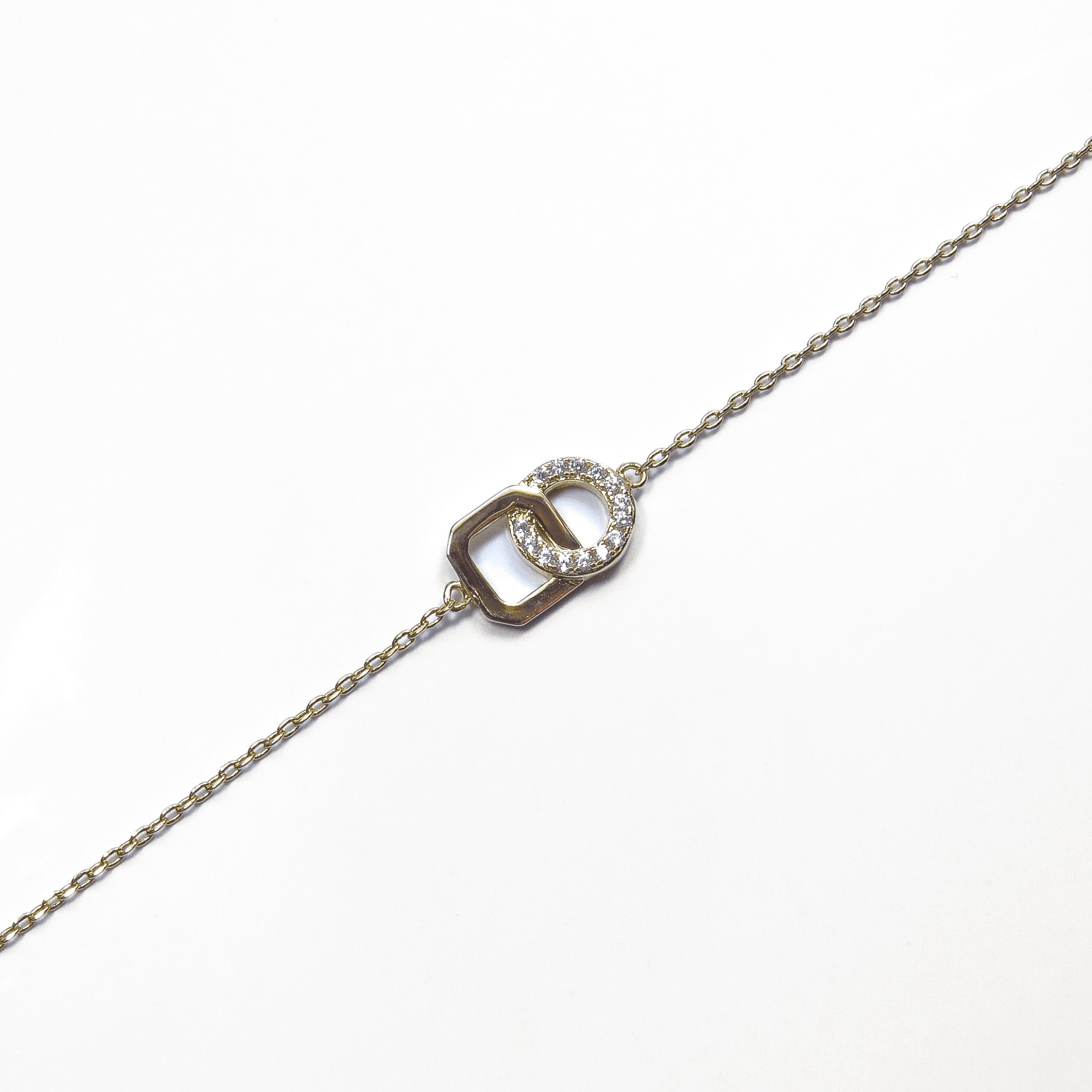 bracelet plaqué or 18 carats avec maillons ovales entrelacés et oxydes de zirconium